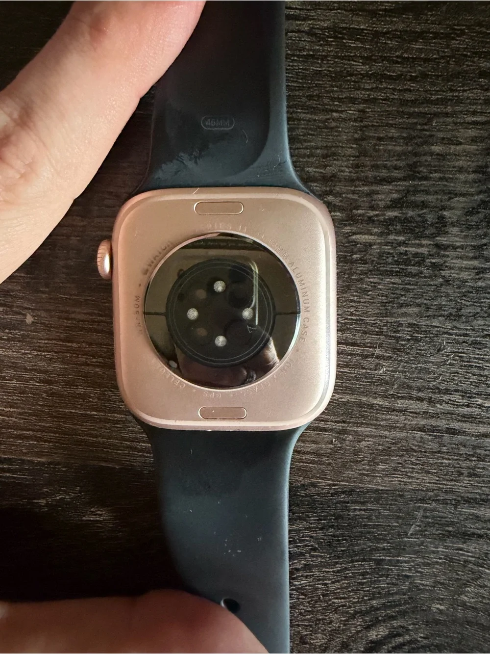 Apple Watch 11 with Black Sport Band and Rose Gold Case